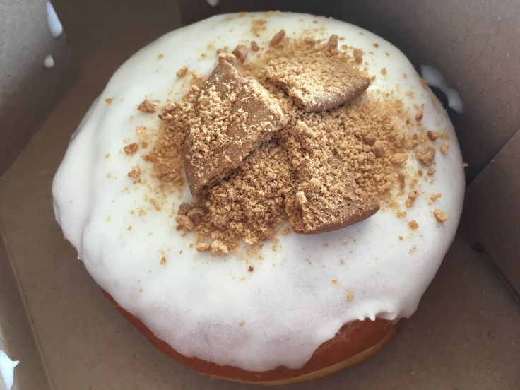 The Guava + Cheese Donut at The Salty Donut in Miami, Florida's Wynwood Art Distritct - A 24 hour raised brioche donut with guava & cream cheese filling, cream cheese glaze, topped with Galleta Maria crumble.
