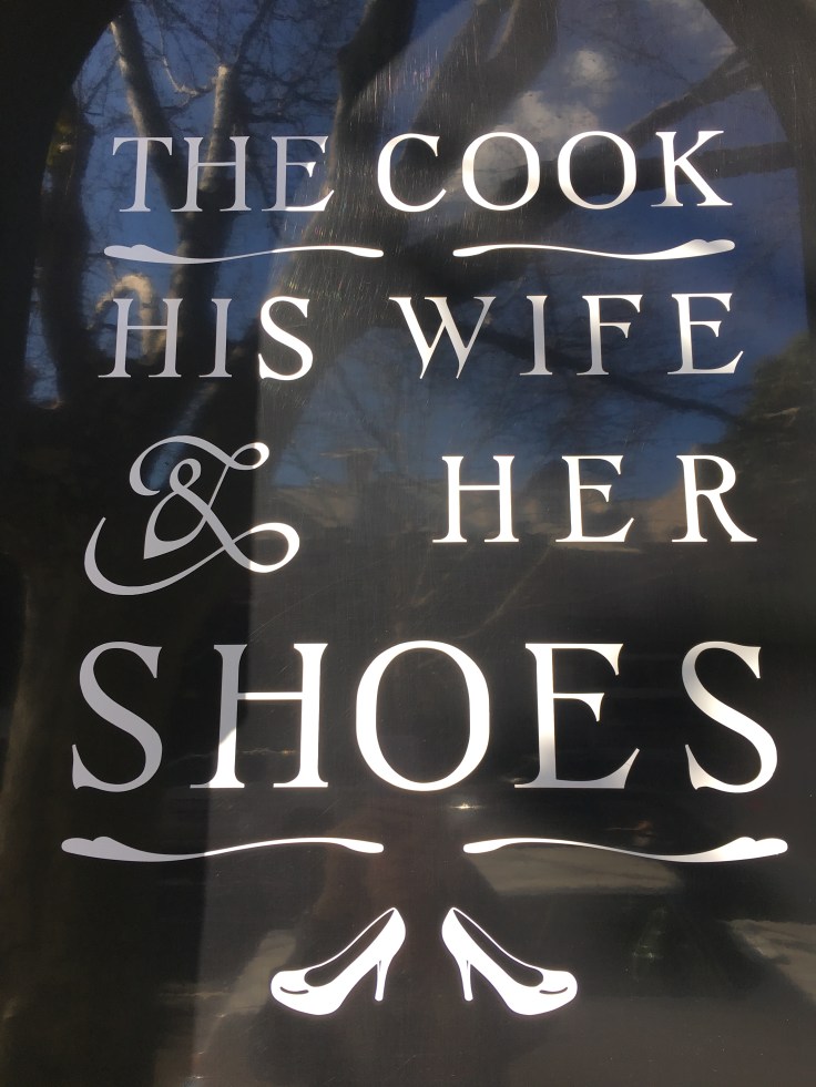 A Sign that Says, "The Cook, His Wife & Her Shoes" in the Surry Hills Suburb of Sydney, Australia