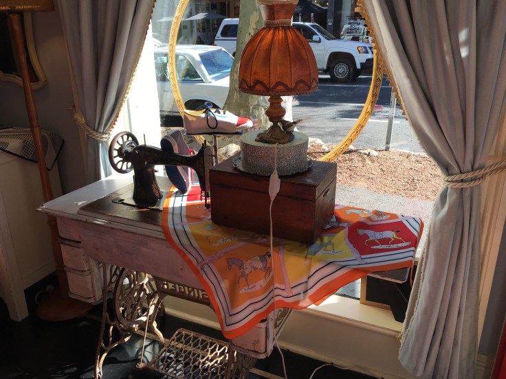 Chic Shoes Sit on an Antique Sewing Machine in a Window at The Cook, His Wife & Her Shoes in the Surry Hills Suburb of Sydney, Australia