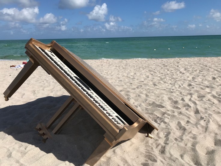 A Key Piece of Artwork - Tunney Transported Giant Pieces of the Taj Mahal Like This Gold Piano to Faena Beach in Miami, Florida