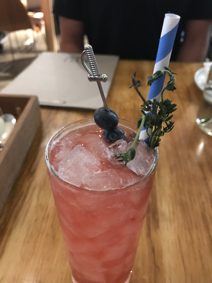 It's Cobblering Thyme - A Sweet Cocktail Made With Hendrick's Gin Plus House Made Blueberry Lemon Thyme Jam at KYU in Miami, Florida