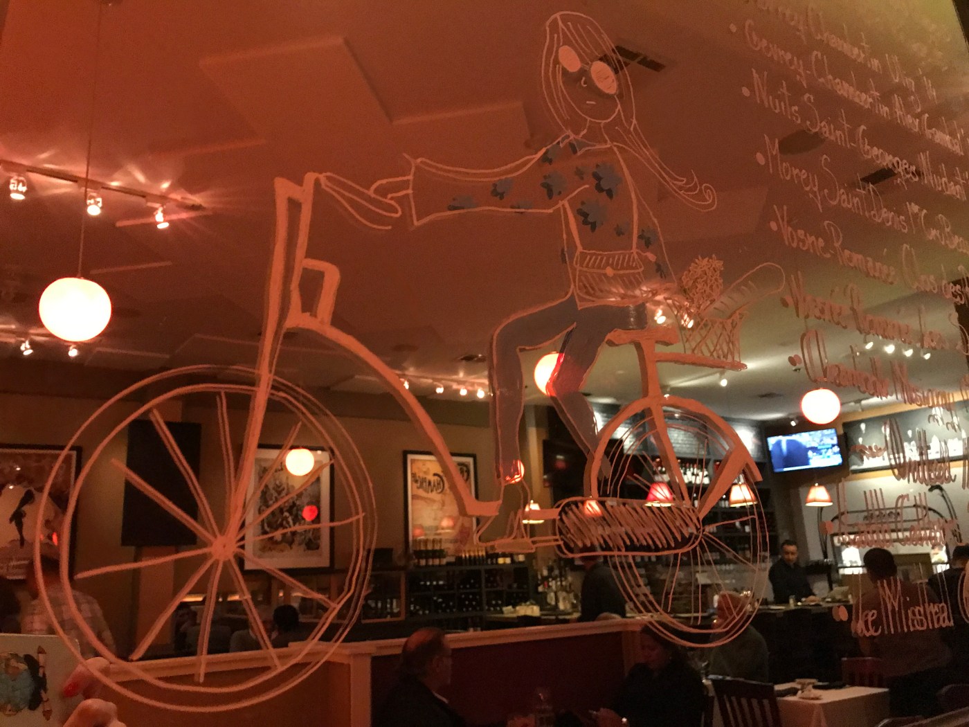 Cute Parisian Style Drawings on the Mirrors at La Bohème's French Restaurant in Palo Alto, California