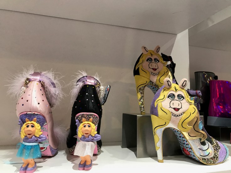 A photo of the all about moi and the original diva Miss Piggy high heels on display at the Irregular Choice shoe store in London, England.