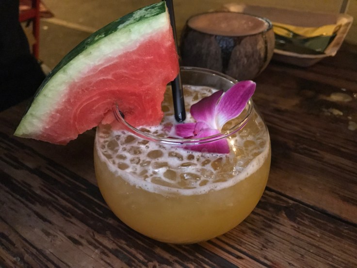 A photo of the mama Africa drink at Ambiente Africa in Stuttgart, Germany. The mama Africa cocktail is made out of Dzama rum from Madagascar, coconut, melon liqueur, Triple Sec, orange, passionfruit and pineapple juice. (Mama Africa - Dzama rum, cocos, melonenlikör, Triple Sec, orangen, maracuja und ananassaff)