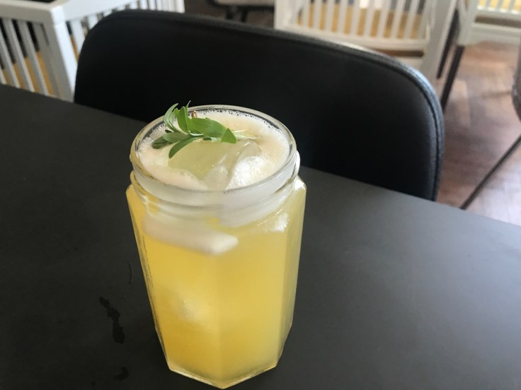The psicoestimulante cocktail at Pharmacia in Lisbon, Portugal. The drink is made with arbutus brandy, honey and passionfruit. (Medronho, mel e maracujá)
