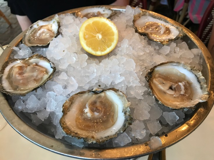 A plate of oysters (huîtres) at Au Pied de Cochon restaurant in Paris, France.