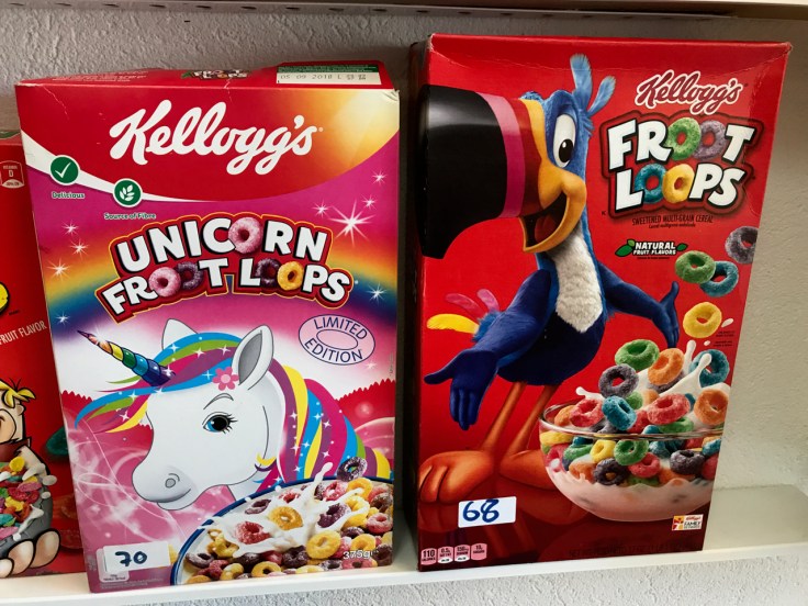 A photo of a box of Kellogg's Unicorn Froot Loops and Kellogg's Froot Loops at the Pop Cereal Café restaurant in Porto, Portugal.