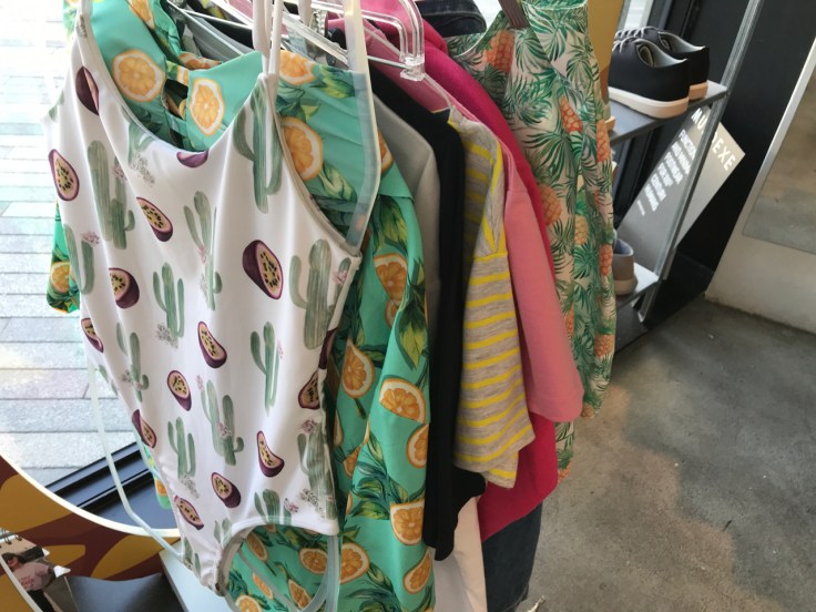 Brightly colored passion fruits, oranges and pineapples decorate bathing suits, swimsuits and gear as a result of a collaboration with Portuguese beverage brand Sumol at the Paez clothing and shoe store in Porto, Portugal. Photo Courtesy of FoodWaterShoes