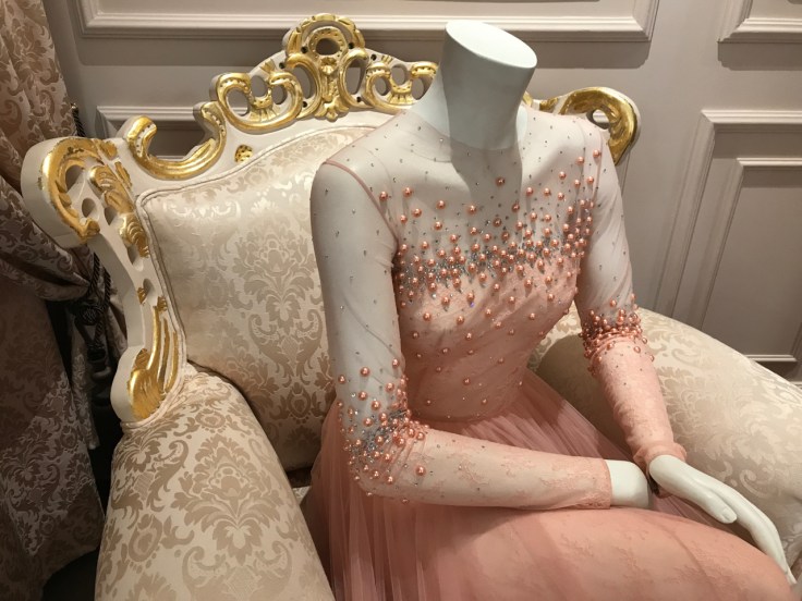 A pink princess tulle gown with beaded pearls on display at local fashion designer João Rôlo Couture. The haute couture atelier dress boutique is located in Lisbon, Portugal. Photo Courtesy of FoodWaterShoes