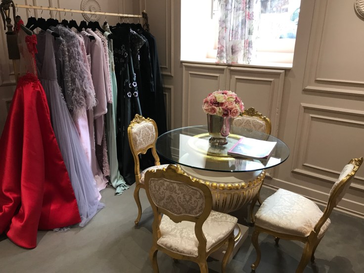 Gorgeous gowns hang on the rack in the front parlor at local fashion designer João Rôlo Couture's atelier in Lisbon, Portugal. Photo Courtesy of FoodWaterShoes