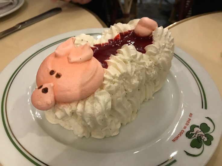 Vacherin du pied de cochon consists of layers of meringue and ice cream in pig cake form at Au Pied de Cochon restaurant in Paris, France.