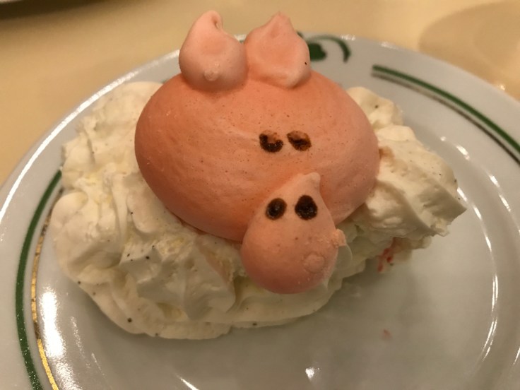 A sweet pig head. Vacherin du pied de cochon consists of layers of meringue and ice cream in pig cake form at Au Pied de Cochon restaurant in Paris, France.