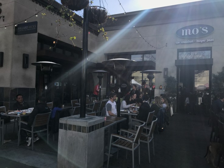 An exterior street view photo of the outside front of Mo's Breakfast + Burger Joint in Campbell, California. Photo Courtesy of FoodWaterShoes
