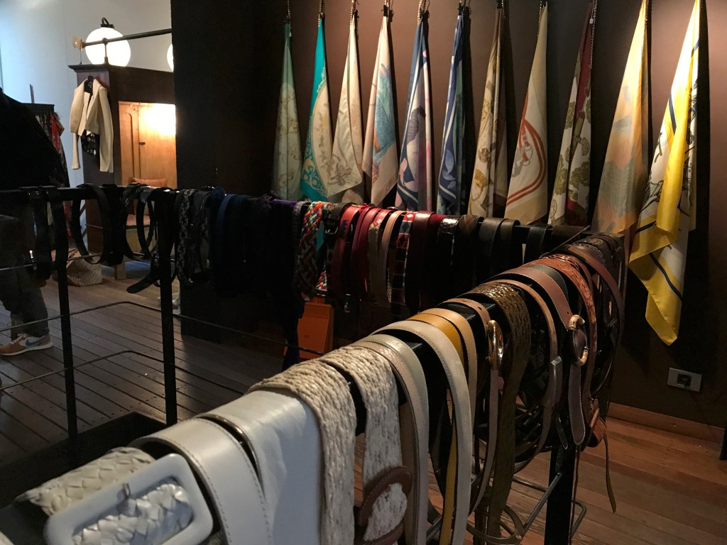 A photo of vintage silk Hermès scarves and pretty secondhand belts at Isabelle Bajart boutique in Brussels (Bruxelles), Belgium. Photo Courtesy of FoodWaterShoes