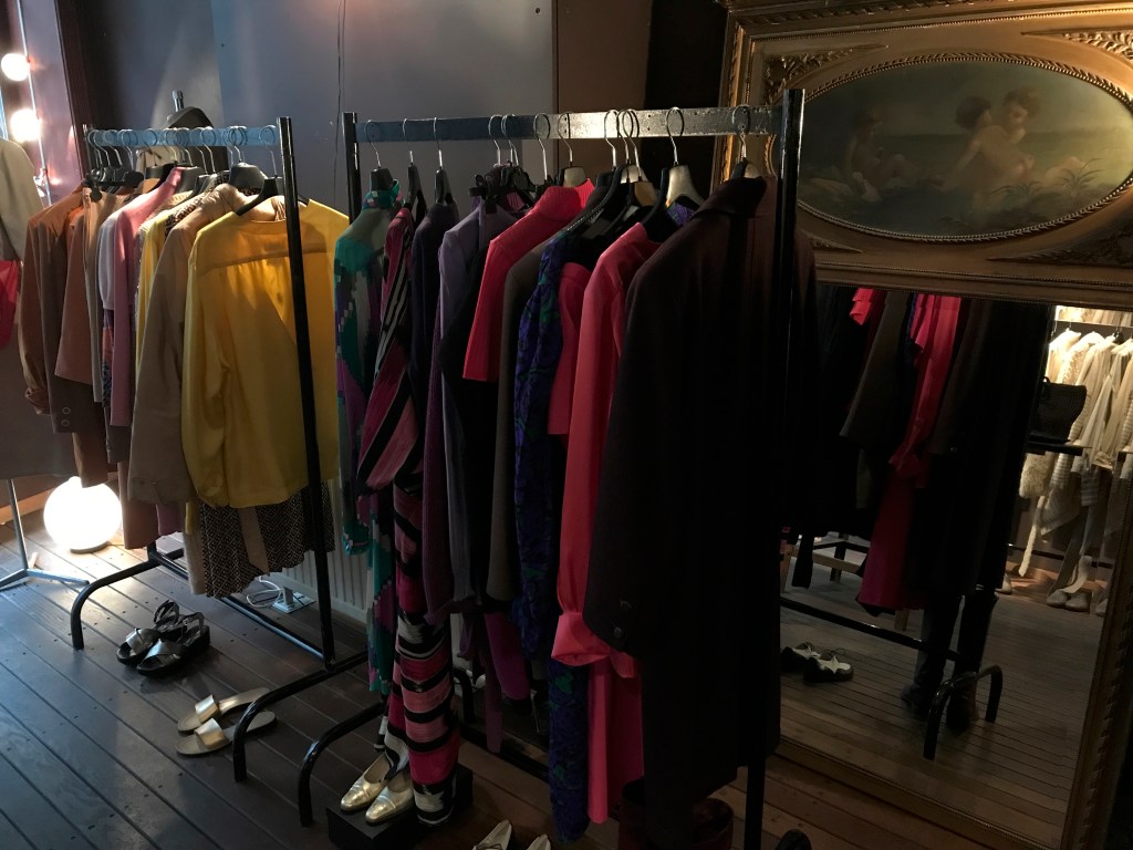 A photo of a racks of high end designer vintage clothing at secondhand boutique Isabelle Bajart in Brussels (Bruxelles), Belgium. Photo Courtesy of FoodWaterShoes