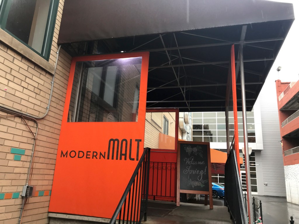 An exterior street view photo of Modern Malt, a diner in Syracuse, New York. This is a picture of the outside front of the CNY Central New York comfort food spot. Photo Courtesy of FoodWaterShoes.