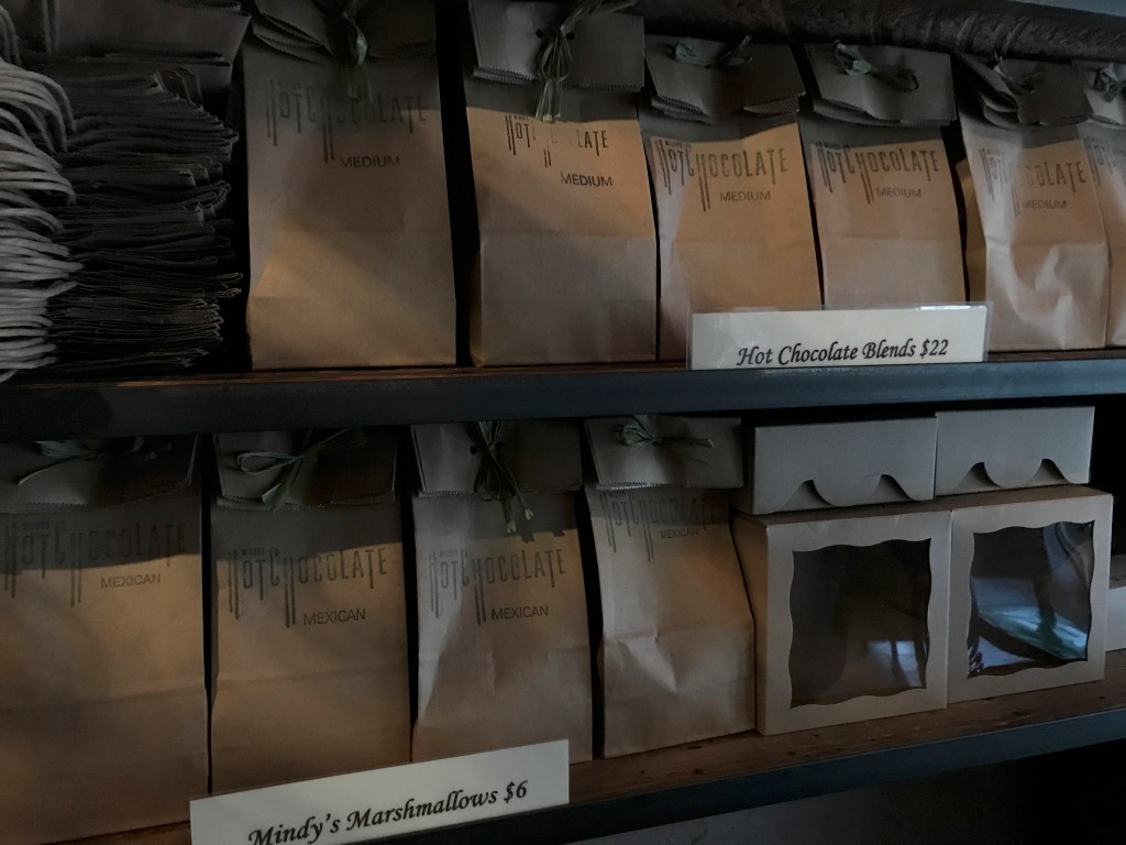 A photo of packages of hot chocolate blends and homemade marshmallows to-go at local hot spot Mindy's Hot Chocolate Chicago in Chicago, Illinois. The Windy City based dessert restaurant serves brunch, cocktails, drinks, lunch and dinner. Photo Courtesy of FoodWaterShoes