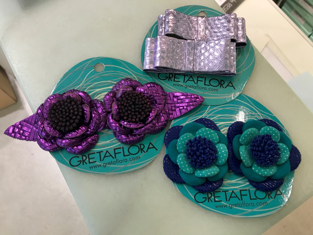 A photo of clip on high heel accessories in the shape of flowers and bows at the GretaFlora shoe shop in Buenos Aires, Argentina. If you're interested in fashion and high heel shopping in Buenos Aires, this is one boutique you won't want to miss. Photo Courtesy of FoodWaterShoes