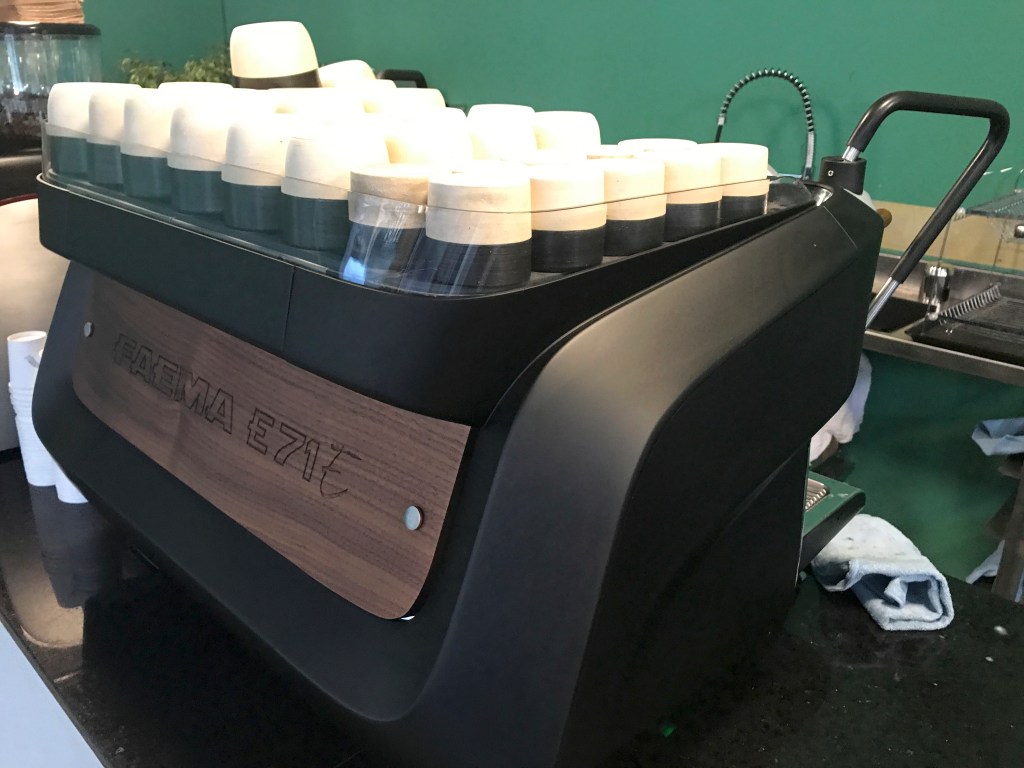 A photo of an Italian made Faema E71 espresso coffee machine and elegant cups at Nómade, a café in Montevideo, Uruguay. Photo Courtesy of FoodWaterShoes