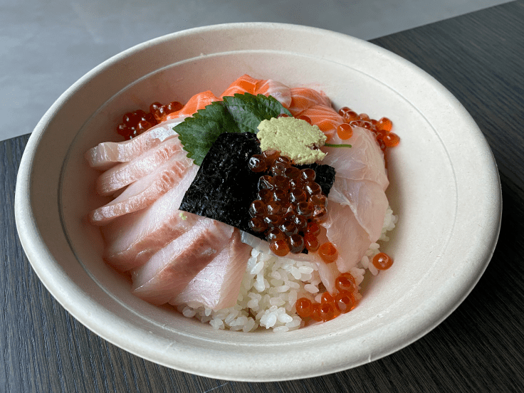 four pieces each of sashimi: shima aji, hamachi and king salmon along with ikura, koshihikari rice, fresh wasabi and ponzu. The local little Bay Area restaurant is doing takeout in Silicon Valley during coronavirus pandemic. Photo Courtesy of FoodWaterShoes