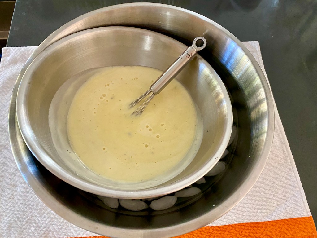 An ice cream base mixture sitting inside an ice bath. Photo Courtesy of FoodWaterShoes