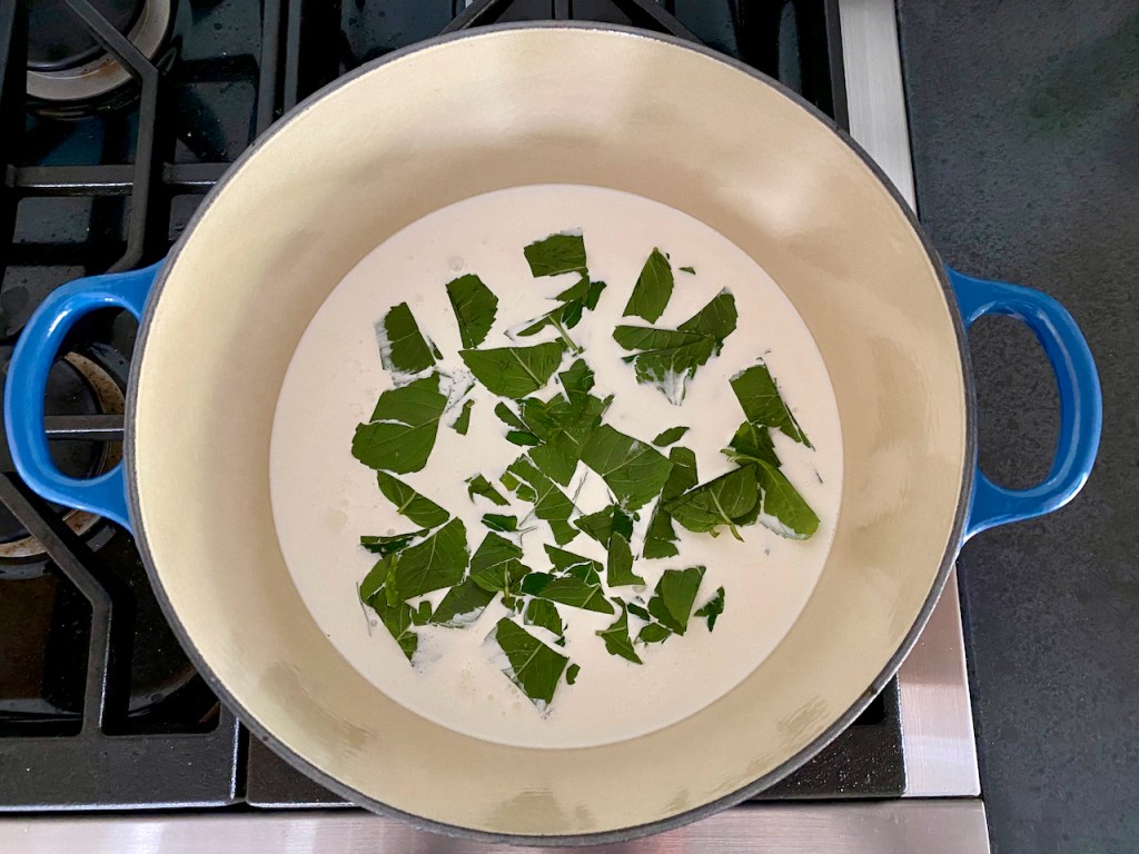 Freshly cut wild mint in a mixture of non-fat milk and cream in a Le Creuset. Photo by FoodWaterShoes